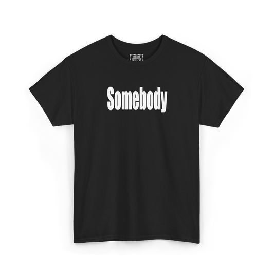 Black t-shirt with "Somebody" printed in white on the chest