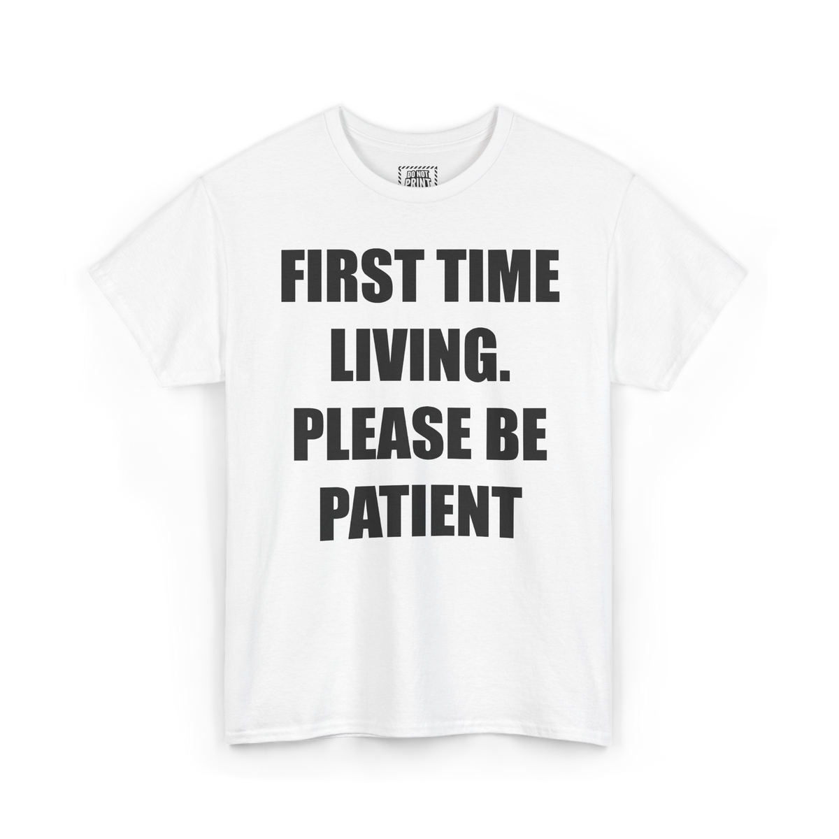 White t-shirt with "FIRST TIME LIVING. PLEASE BE PATIENT" printed in black on the chest