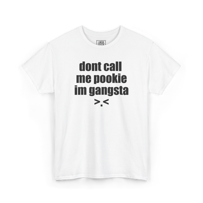 White t-shirt with "dont call me pookie im gangsta" and a >.< face printed in black on the chest