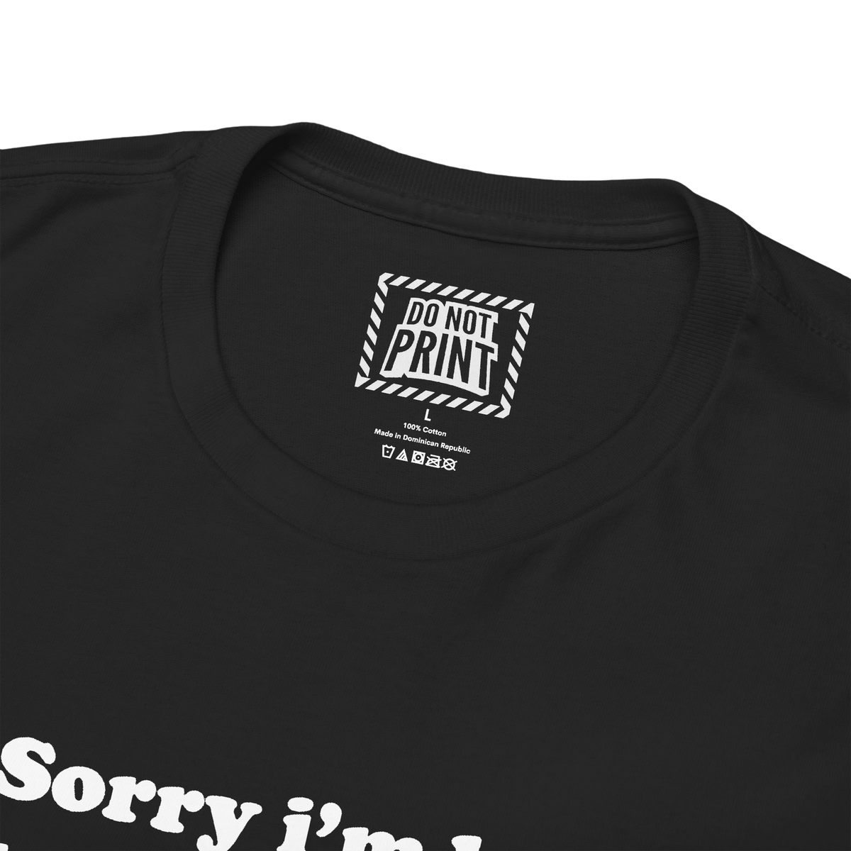 Close-up of the collar and neck label on the black "Sorry i'm late I didn't want to come" t-shirt