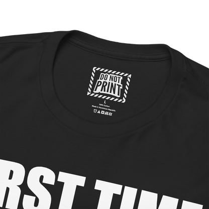 Close-up of the collar and neck label on the black "FIRST TIME LIVING. PLEASE BE PATIENT" t-shirt