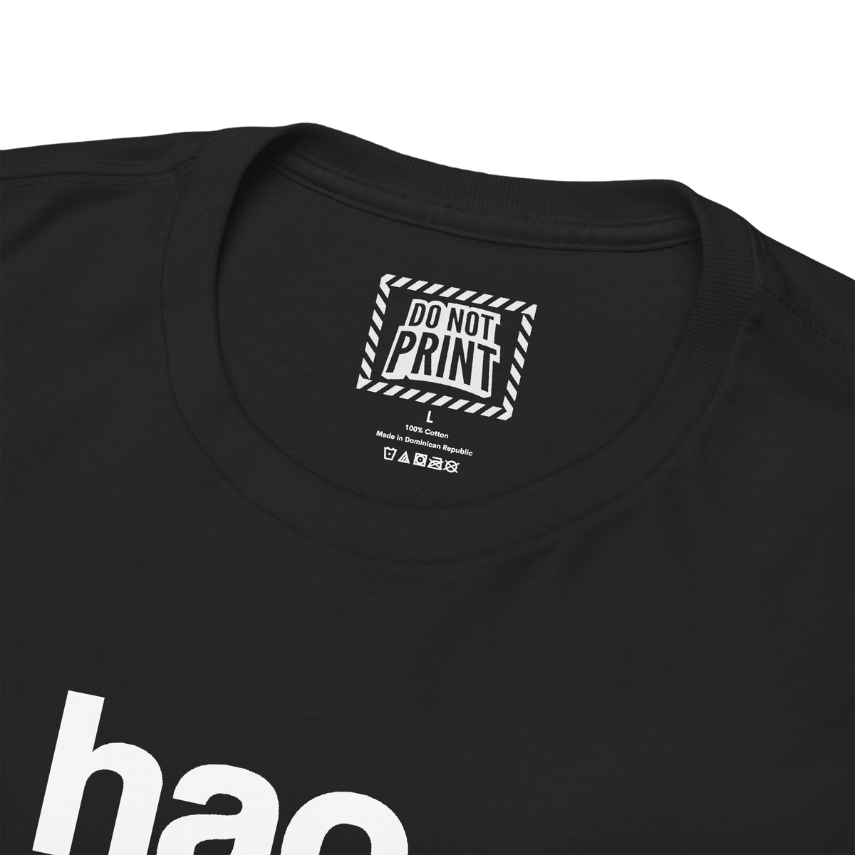 Close-up of the collar and neck label on the black "ni hao fine shyt" t-shirt
