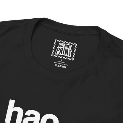 Close-up of the collar and neck label on the black "ni hao fine shyt" t-shirt