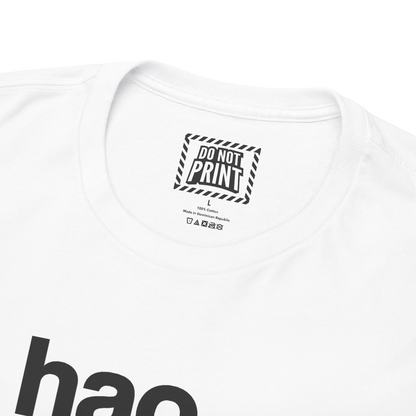 Close-up of the collar and neck label on the white "ni hao fine shyt" t-shirt