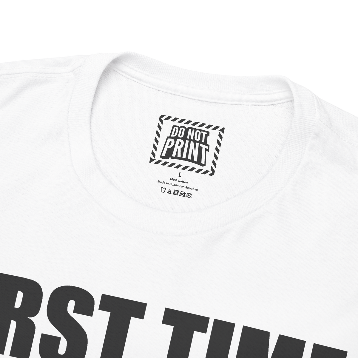 Close-up of the collar and neck label on the white "FIRST TIME LIVING. PLEASE BE PATIENT" t-shirt