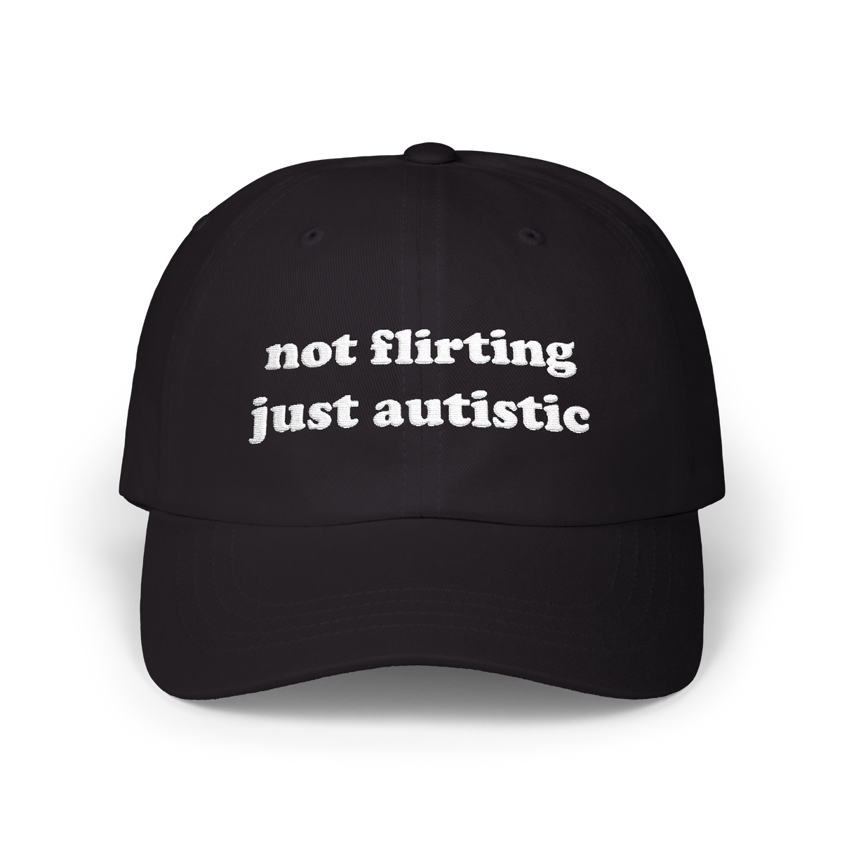 Black dad hat with "not flirting just autistic" embroidered in white on the front panel