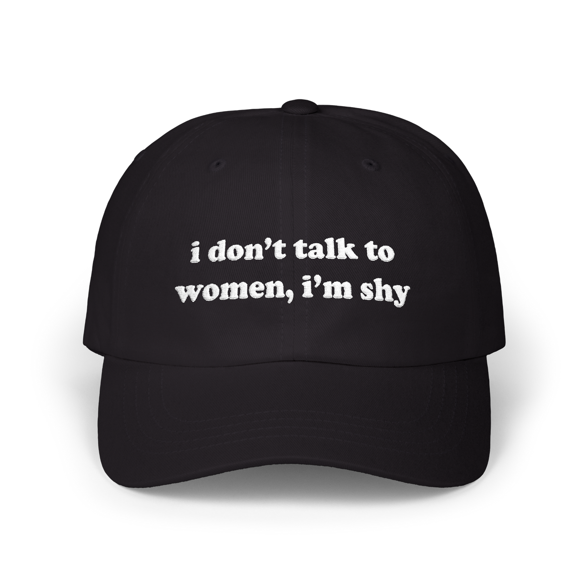Black dad hat with "i don't talk to women, i'm shy" embroidered in white on the front panel