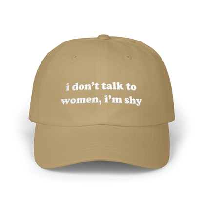 Khaki dad hat with "i don't talk to women, i'm shy" embroidered in white on the front panel