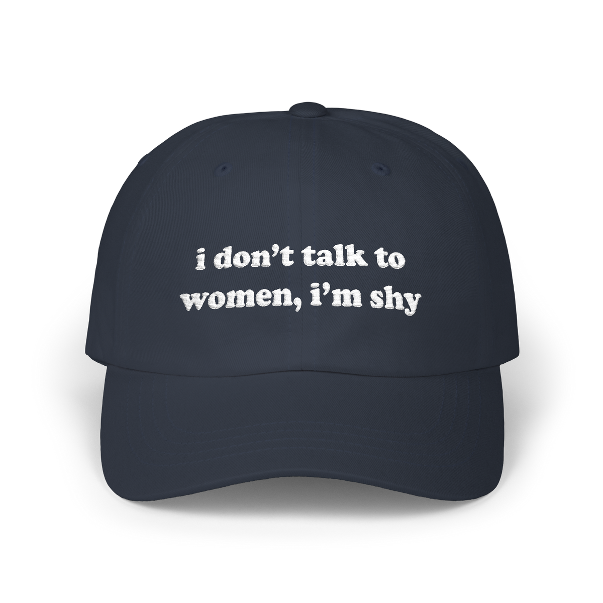 Navy dad hat with "i don't talk to women, i'm shy" embroidered in white on the front panel