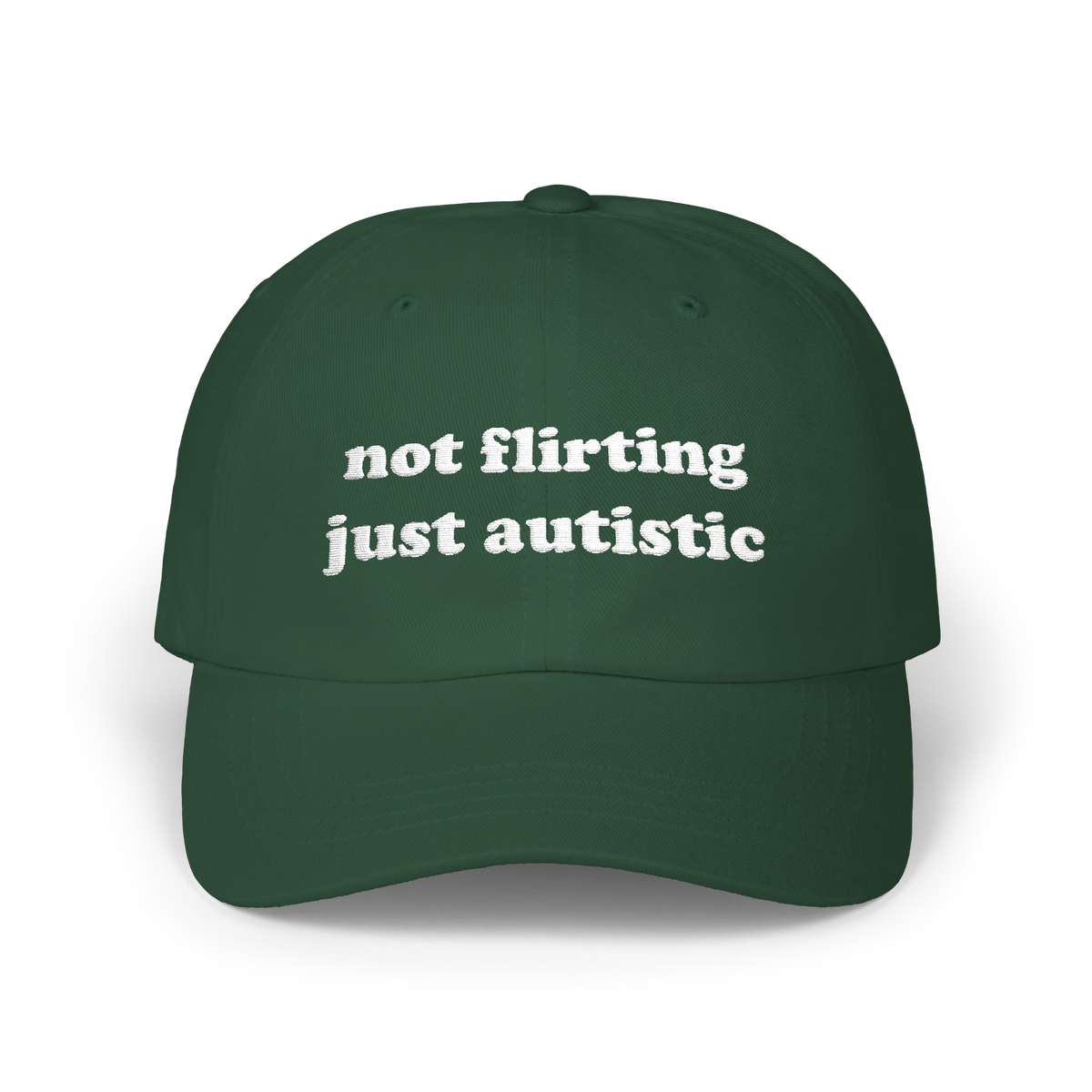Spruce green dad hat with "not flirting just autistic" embroidered in white on the front panel