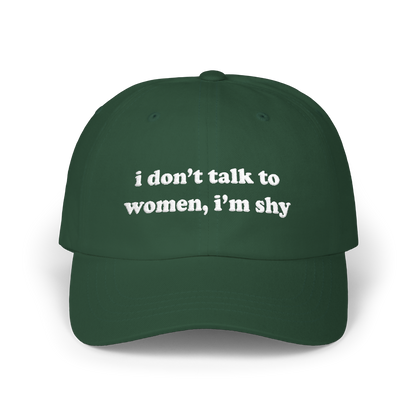 Spruce green dad hat with "i don't talk to women, i'm shy" embroidered in white on the front panel